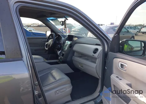 2010 Honda Pilot Touring z USA, uszkodzony, nr VIN 5FNYF3H95AB023041